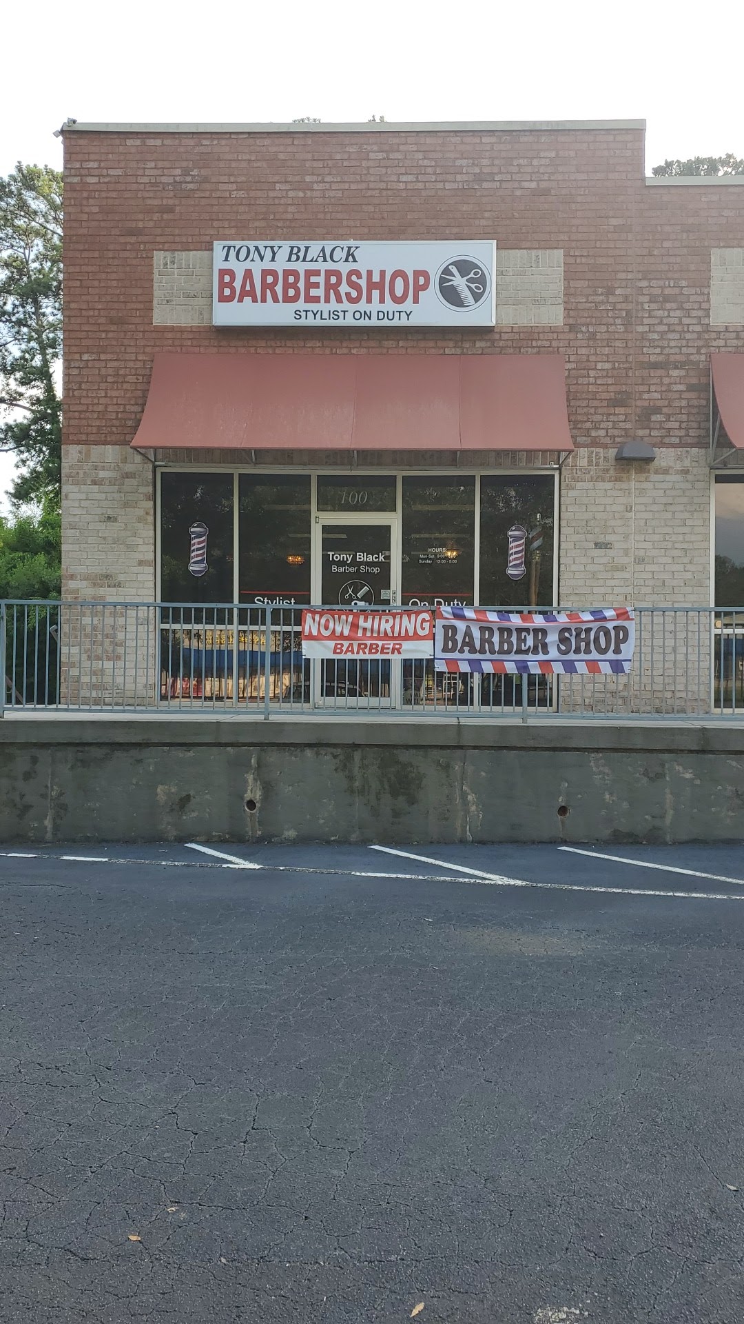 Tony Black Barbershop storefront on Davis Rd in Stockbridge, GA