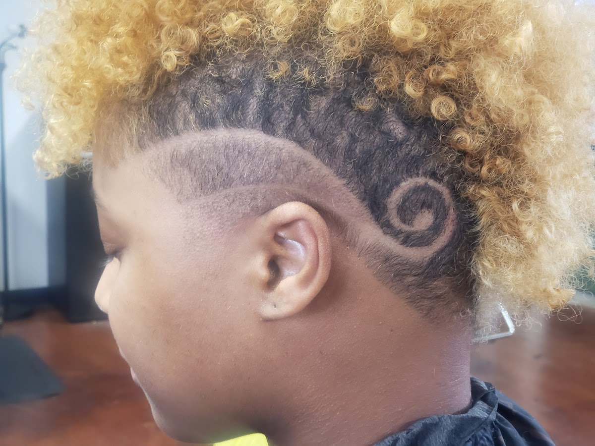 Detailed swirl hair design with blonde curls on top